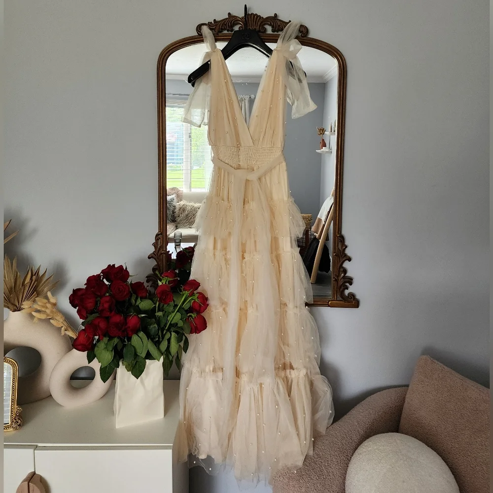 Ivorie Kai size medium